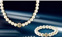 AVON Браслет и колье "жемчужная история" Светлый "жемчуг"